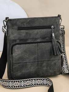 Dark grey canvas crossbody bag with dual zippers and ethnic style shoulder strap