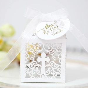 European white hollow gift box with cross pattern, white ribbon, and thank you tag