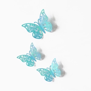 Three cyan 3D hollow butterfly wall stickers with intricate floral laser-cut texture