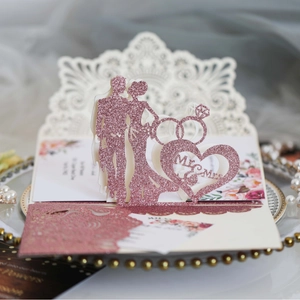 Invitation de mariage 3D rose avec paillettes et silhouette ajourée Mr & Mrs élégante