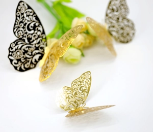 Detailed 3D hollow butterfly wall stickers with golden vine pattern and 3D folding effect