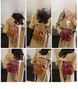 Detail view of stylish bow decor on vintage PU leather backpack for women's fashion