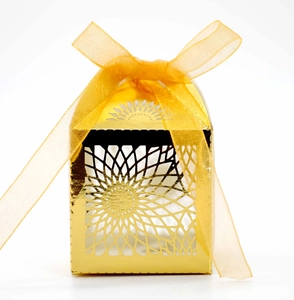 Golden laser-cut sunflower hollow gift box with elegant ribbon for wedding party favors