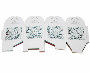 White laser-cut rose hollow candy box for weddings with an elegant floral design