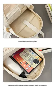 Interior detail of large capacity backpack showing laptop compartment and mesh pocket