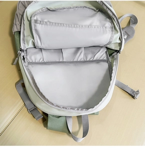 Detailed interior view of spacious laptop backpack with elastic storage compartment