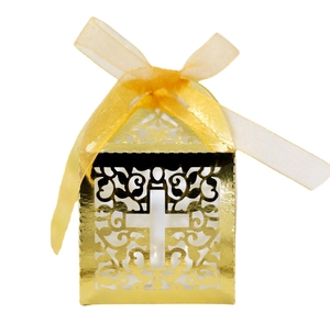 Elegant gold laser-cut candy box featuring hollow vine patterns and a cross symbol