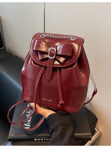 Retro burgundy patent leather backpack with bow and silver chain strap for women