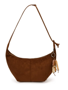 Brown suede crescent shoulder bag with wooden bead charm and adjustable strap