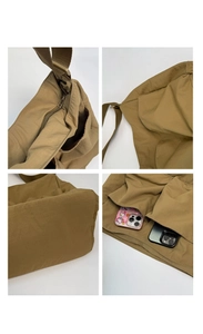 Details des verstellbaren Riemens und der Handytasche der khakifarbenen Nylon-Umhängetasche