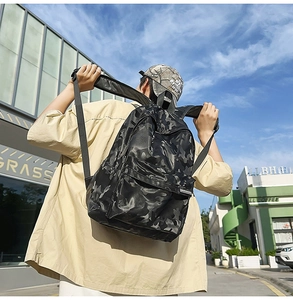 Outdoor shot of a large capacity camouflage backpack for students and travelers