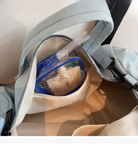 Detailed view of the waterproof wet and dry separation compartment inside a travel bag