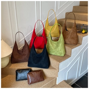 Retro matte suede tote bags in various colors displayed on steps with accessory pouches