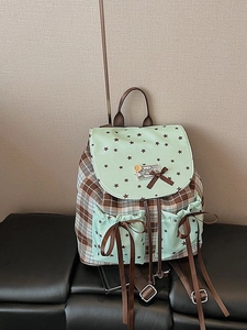 Mint green plaid backpack with star print and bow accents for a cute school style