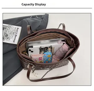 Top view of large capacity dark brown woven tote bag showing internal storage space