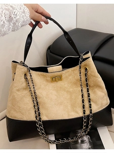 Quilted khaki suede and black leather tote bag with gold chain strap and turn-lock closure