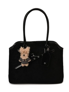 Retro black tote bag with matte texture and glossy leather trim featuring dog charm