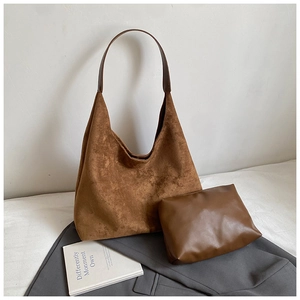 Detail of vintage brown frosted tote bag with matching inner pouch and arc handle