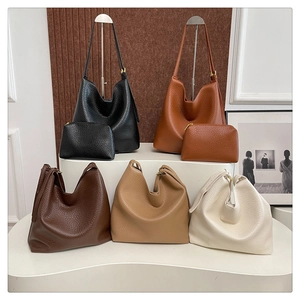 Litchi pattern leather Hobo bag set in five colors displayed on tiered shelves