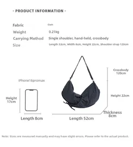 Detailed view of black crescent cloud bag with fabric texture and size dimensions guide
