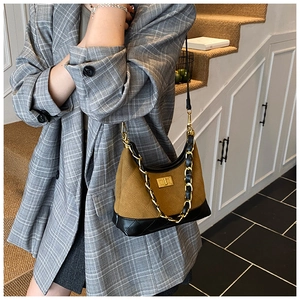 Retro quilted brown suede handbag with golden chain and metallic buckle detail