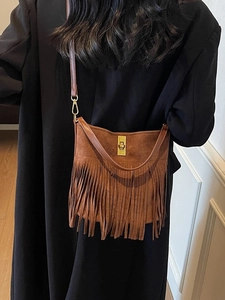 Bohemian brown suede fringe crossbody bag with gold metal twist lock for autumn
