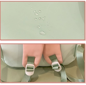 Detail of water-resistant macaron fabric and padded adjustable pink shoulder straps