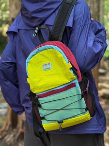 Multicolor outdoor hiking backpack with bungee cords and tear-resistant nylon fabric