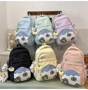 Detailed display of cute high-capacity backpacks in six pastel colors with puppy charms