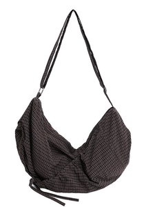 Brown checkered hobo shoulder bag with crescent shape and adjustable strap on white background