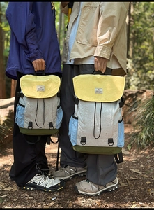 Outdoor backpacks in contrast colors with drawstring closure and retro buckles set