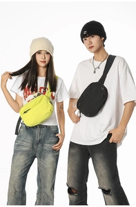 Waterproof nylon sports crossbody bags in vibrant yellow and black with multi-compartments