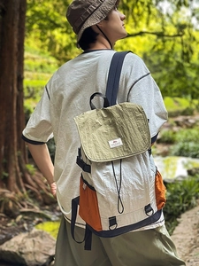 Waterproof nylon patchwork backpack in sage green and white for outdoor leisure