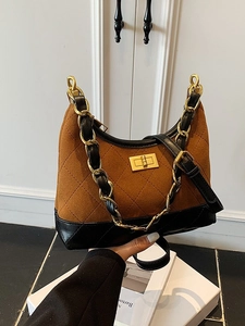 Retro quilted brown suede and black leather underarm bag with gold chain and turn-lock