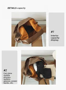 Detail view of large capacity tote bag showing the orange lining and spacious interior