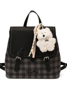 Chic black and gray checkered backpack with leather flap and plush dog charm detail