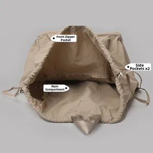 Internal view showing khaki drawstring backpack main pocket, front zip and side pockets