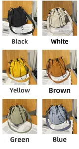 Mini nylon drawstring bucket bags in six vibrant colors displayed on a rustic chair
