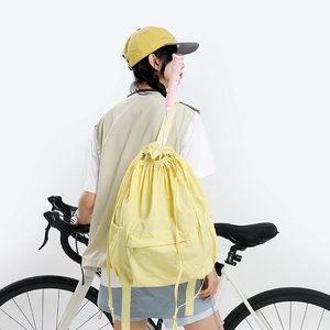 Light yellow lightweight drawstring backpack for outdoor sports and student school life