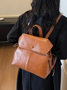 British vintage caramel PU leather backpack with drawstring bows and top handle for women