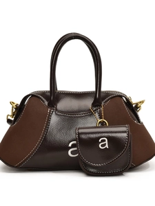 Brown patchwork handbag in glossy leather and matte suede with a small pouch charm