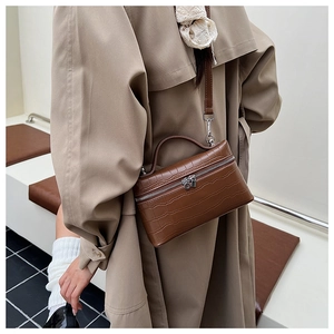 Brown crocodile-textured leather mini square bag with top handle and silver hardware detail