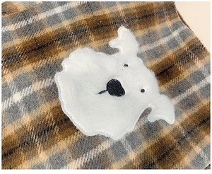 Detail of vintage plaid tote bag featuring a cute 3D plush puppy patch embroidery