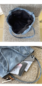 Macro view of blue washed canvas tote showing magnetic closure and zipped inner pocket