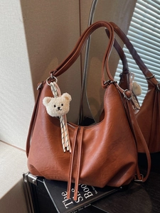 Retro dark brown large capacity tote bag with long tassels and white bear charm