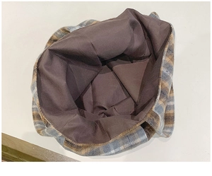 Top view of large plaid tote bag interior showing spacious brown lining and checkered fabric