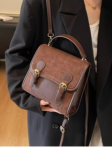 Retro brown frosted leather crossbody backpack with vintage double buckle design for women