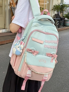 Mint green and pink preppy backpack with lace, bow details and a teddy bear charm