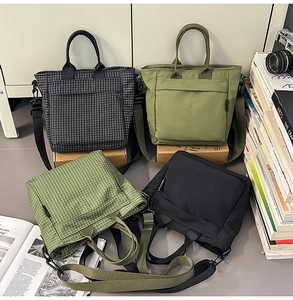 Macro view of four nylon tote bags in checkered and solid colors for daily use