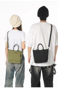 Front zipper pockets and adjustable straps on nylon shoulder bags in green and black